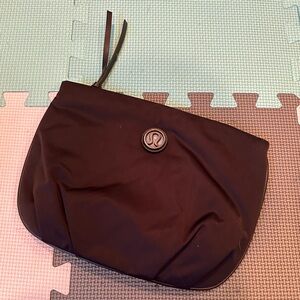 Black Lululemon pouch - unused from a backpack interior but can be its own bag